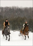Man and Woman Horseback Riding 